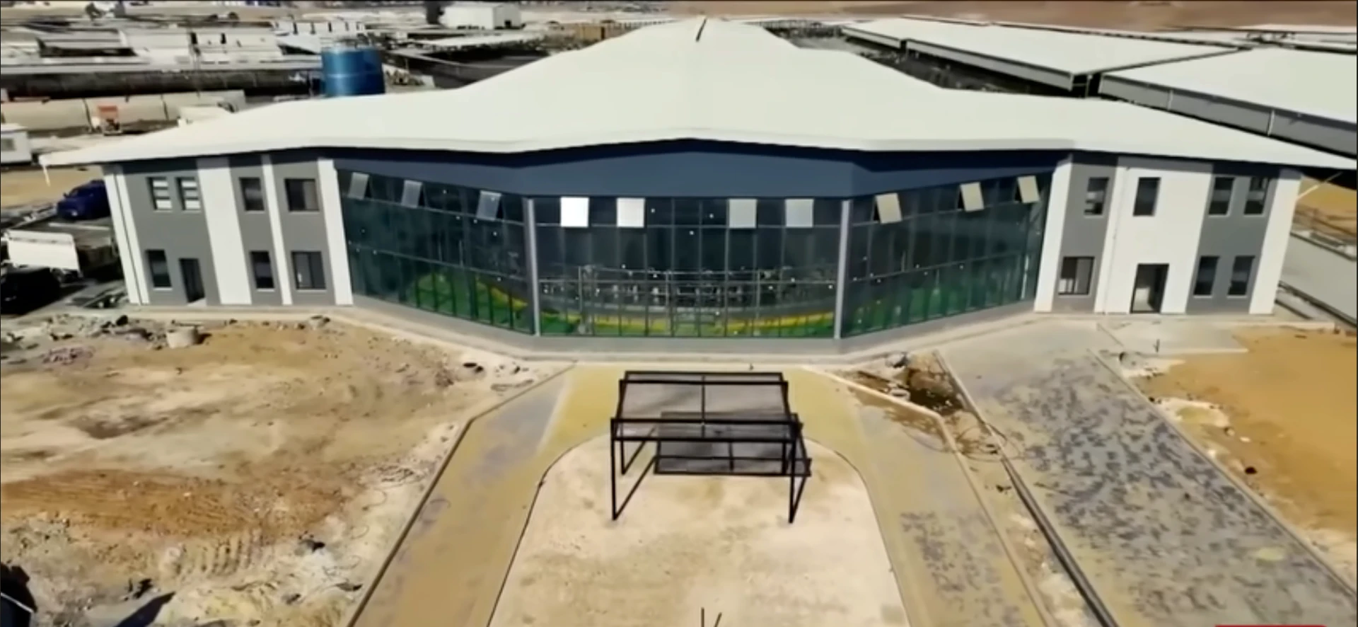 Main facility building with glazed façade at the Al Sheikh Cheese Factory